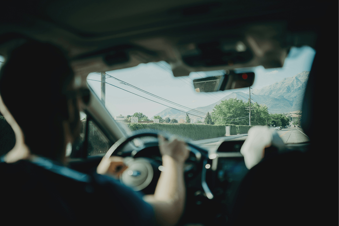 Person driving a car